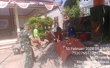 Kodim 0802/Ponorogo Bantu Pengecoran Halaman Kantor Balai Desa 